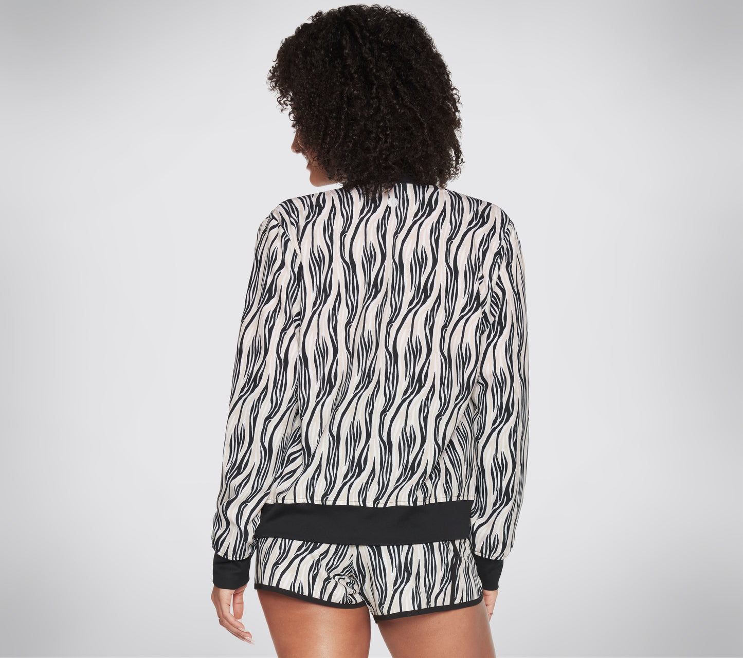 DVF: Skechweave Moving Zebra - Vändbar Bomberjacka Clothes Skechers